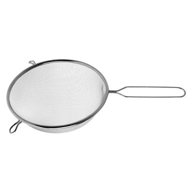 Metal strainer on a white background