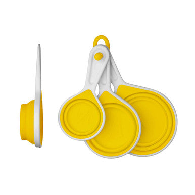 Yellow and white silicone lid set on a white background