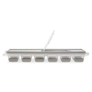 Metallic ice cube tray on a white background