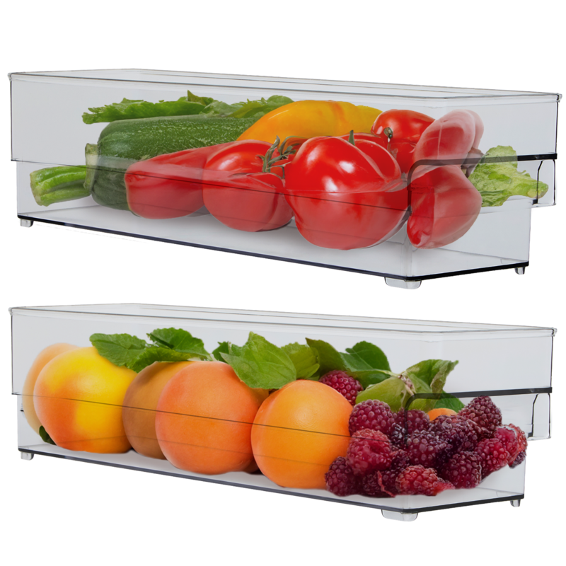 Two clear plastic drawers with vegetables and fruits on a white background