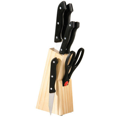 Set of knives with wooden block on a white background