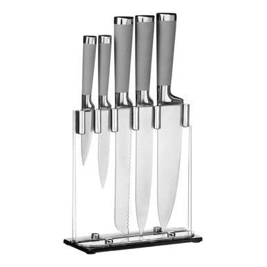Set of knives with silver handles in a clear stand on a white background