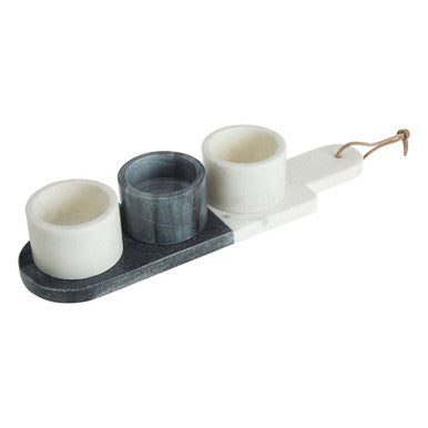 Set of three ceramic containers on a marble tray with a white background