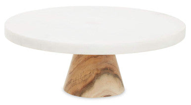 Round white marble cake stand with a wooden base on a white background