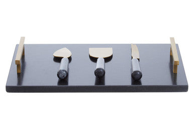 Set of knives on a black cutting board with wooden handles