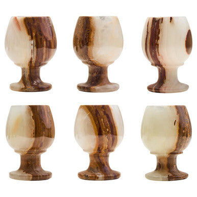 Set of six wooden goblets with a striped pattern on a white background