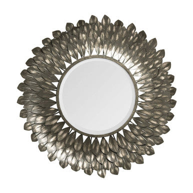 Decorative round mirror with a metallic leaf-like frame on a white background