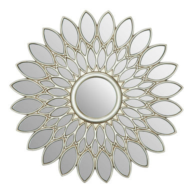 Decorative mirror with a floral design on a white background