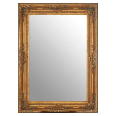 Gold-framed mirror on a white background