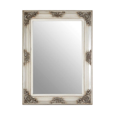 Decorative mirror with ornate silver frame on a white background