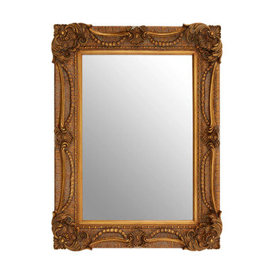 Decorative gold-framed mirror on a white background