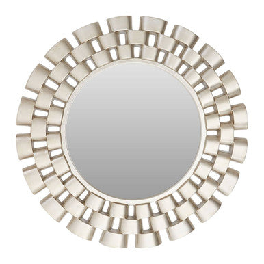 Round mirror with decorative metallic frame on a white background