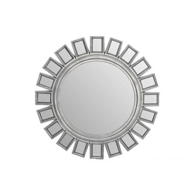 Round mirror with a decorative frame on a white background