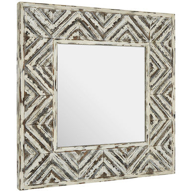 Decorative mirror with geometric patterned frame on a white background