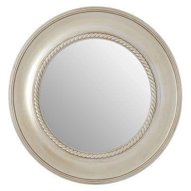Round mirror with decorative frame on a white background