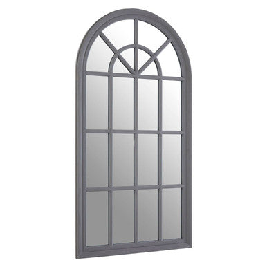 Arched window-style mirror with metal frame on a white background