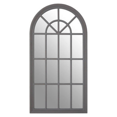 Arched window-style mirror with metal frame on a white background