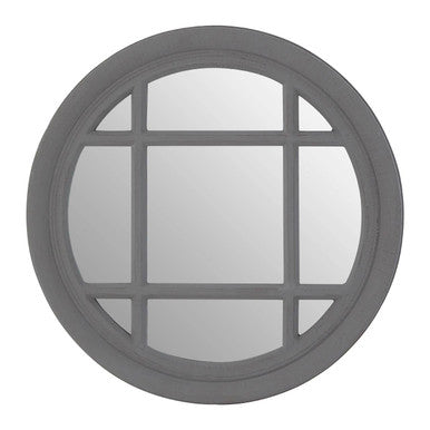Round window with grid design on a white background