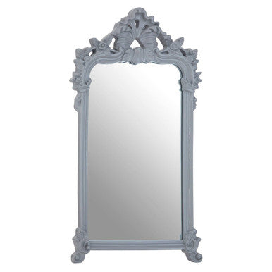 Decorative mirror with an ornate frame on a white background