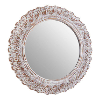 Round decorative mirror with intricate border on a white background
