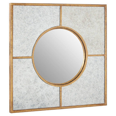 Decorative wall mirror with gold frame and circular center on a white background