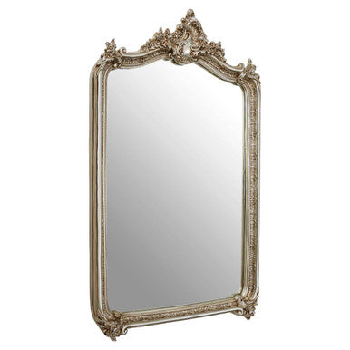 Decorative mirror with ornate frame on a white background