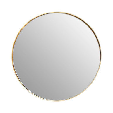 Round mirror with a gold frame on a white background