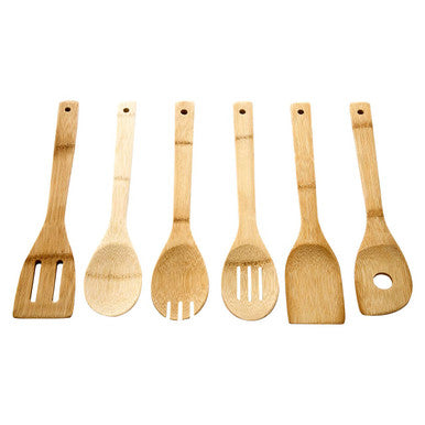 Set of six wooden kitchen utensils on a white background