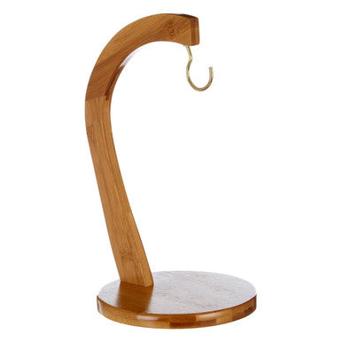 Wooden hook stand with a marble base on a white background