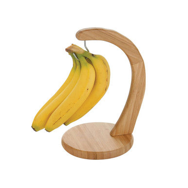 Wooden banana holder with bananas on a white background