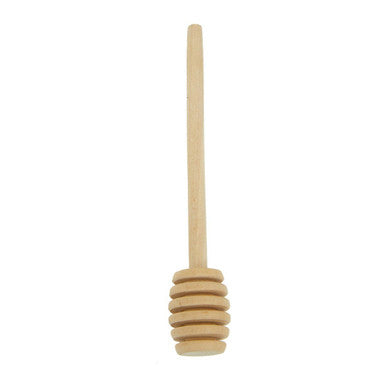 Wooden honey dipper on a white background