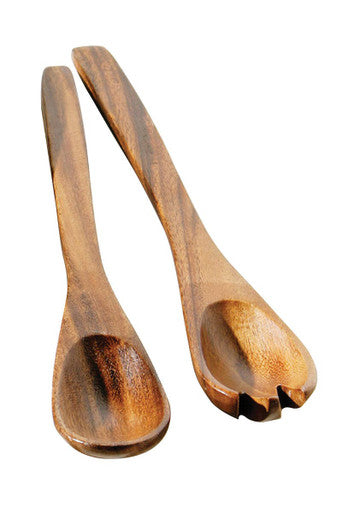 Two wooden spoons on a white background