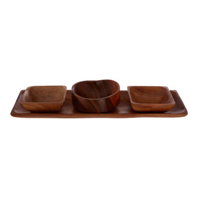 Set of wooden bowls and a tray on a white background