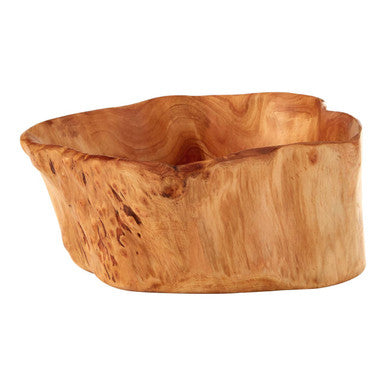 Wooden bowl with natural edge on a white background