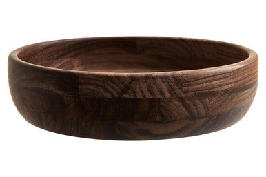 Wooden bowl with a dark brown finish on a white background