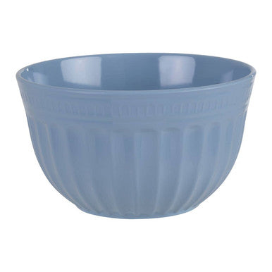 Blue ceramic mixing bowl on a white background