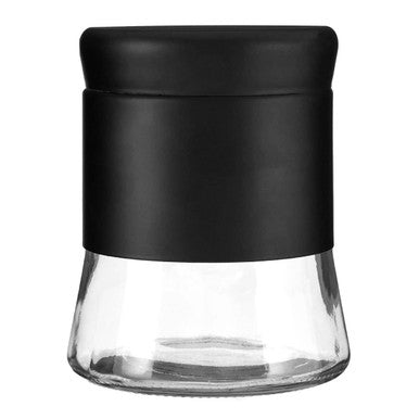Clear glass container with a black lid on a white background