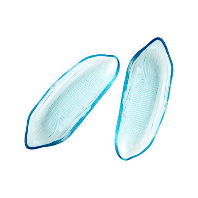 Two blue contact lenses on a white background