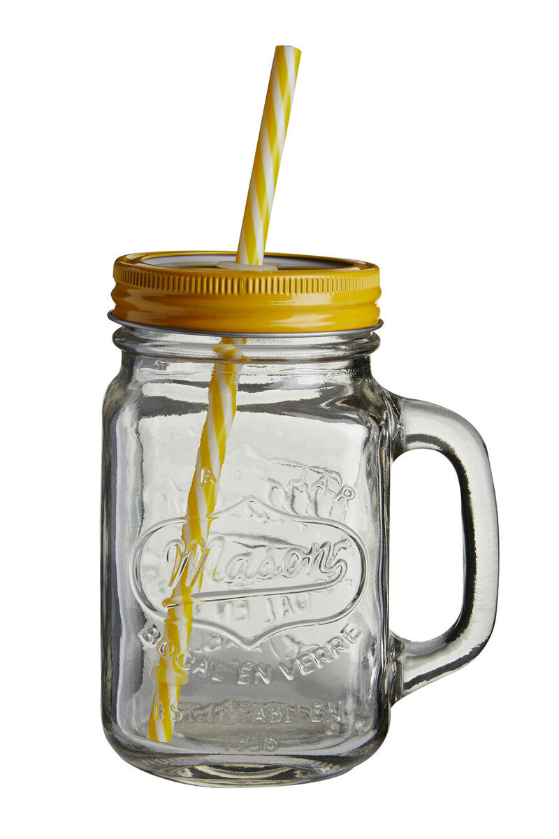 Clear glass mason jar with a yellow lid and straw on a white background