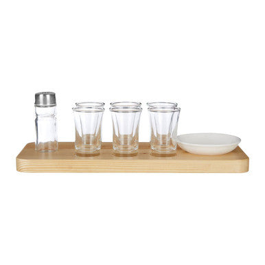 Set of glass tumblers and a salt shaker on a wooden tray with a white background