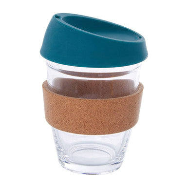 Clear glass cup with a teal lid and brown cork sleeve on a white background