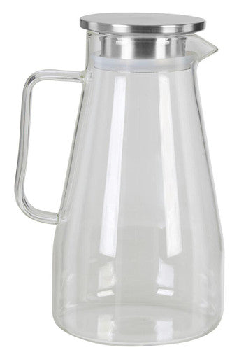 Clear glass pitcher with a silver lid on a white background