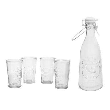 Clear glass bottle and four tumblers on a white background