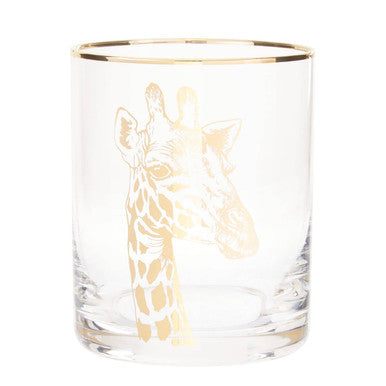 Clear glass tumbler with gold giraffe design on a white background