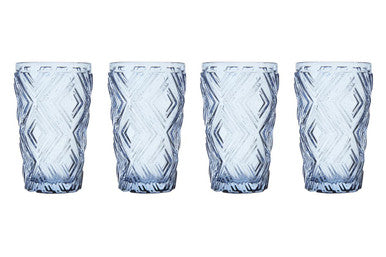 Four textured blue glass tumblers on a white background