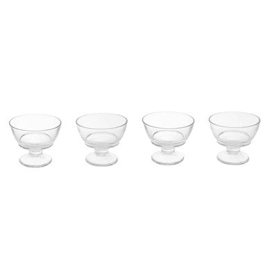 Set of four clear glass dessert bowls on a white background