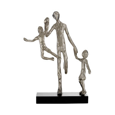 Metallic sculpture of a family on a white background