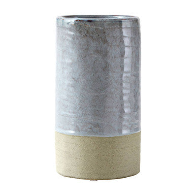 Cylindrical ceramic vase with two-tone design on a white background
