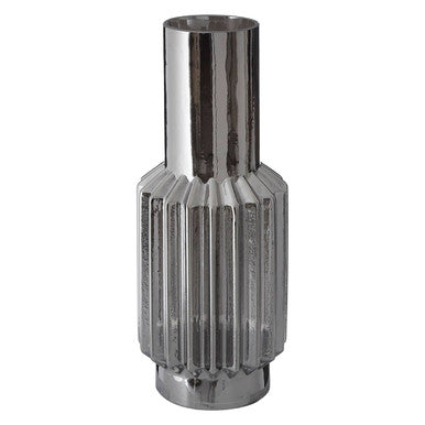 Silver metallic vase with ribbed design on a white background