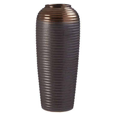 Decorative vase with ribbed design on a white background